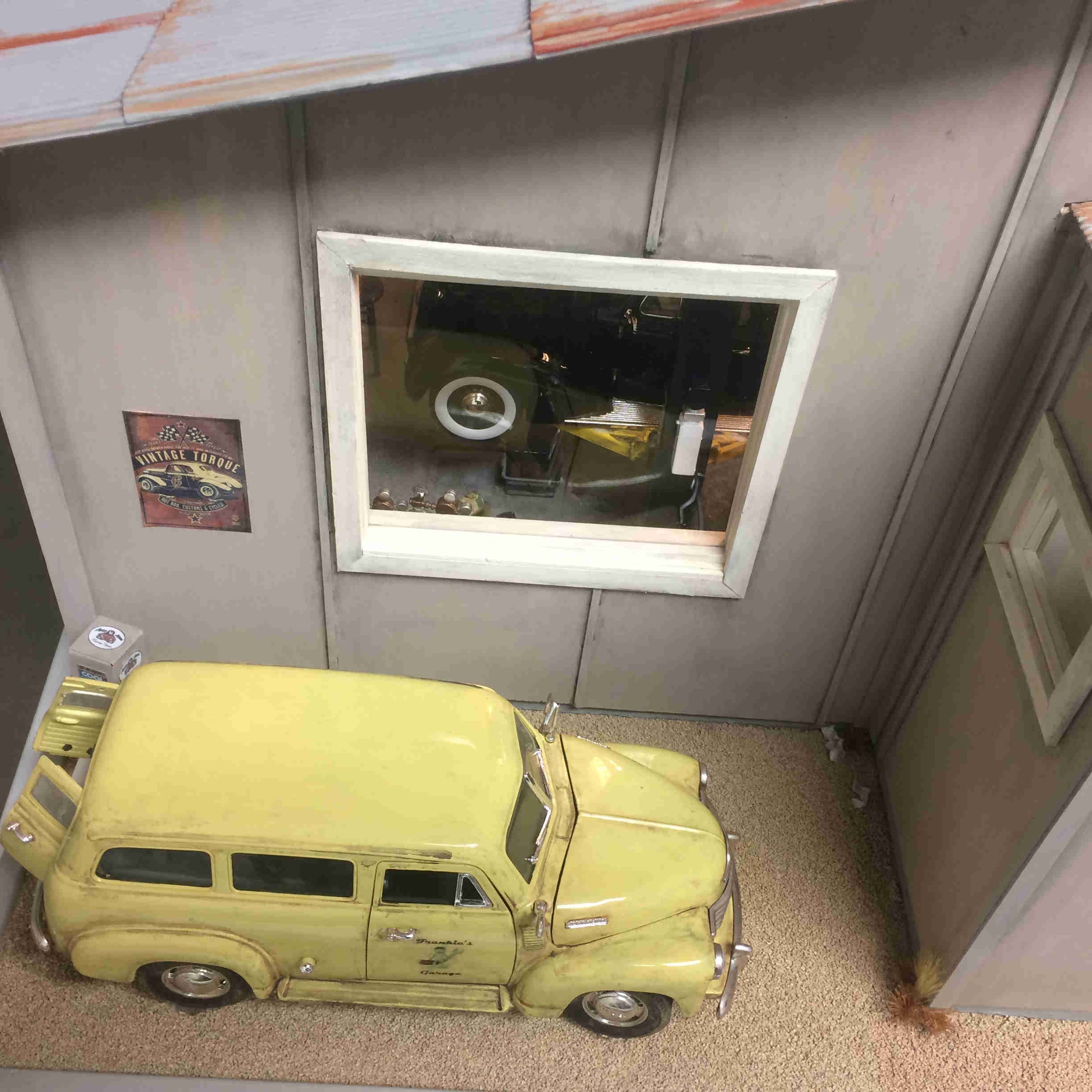 Left side of garage with delivery van