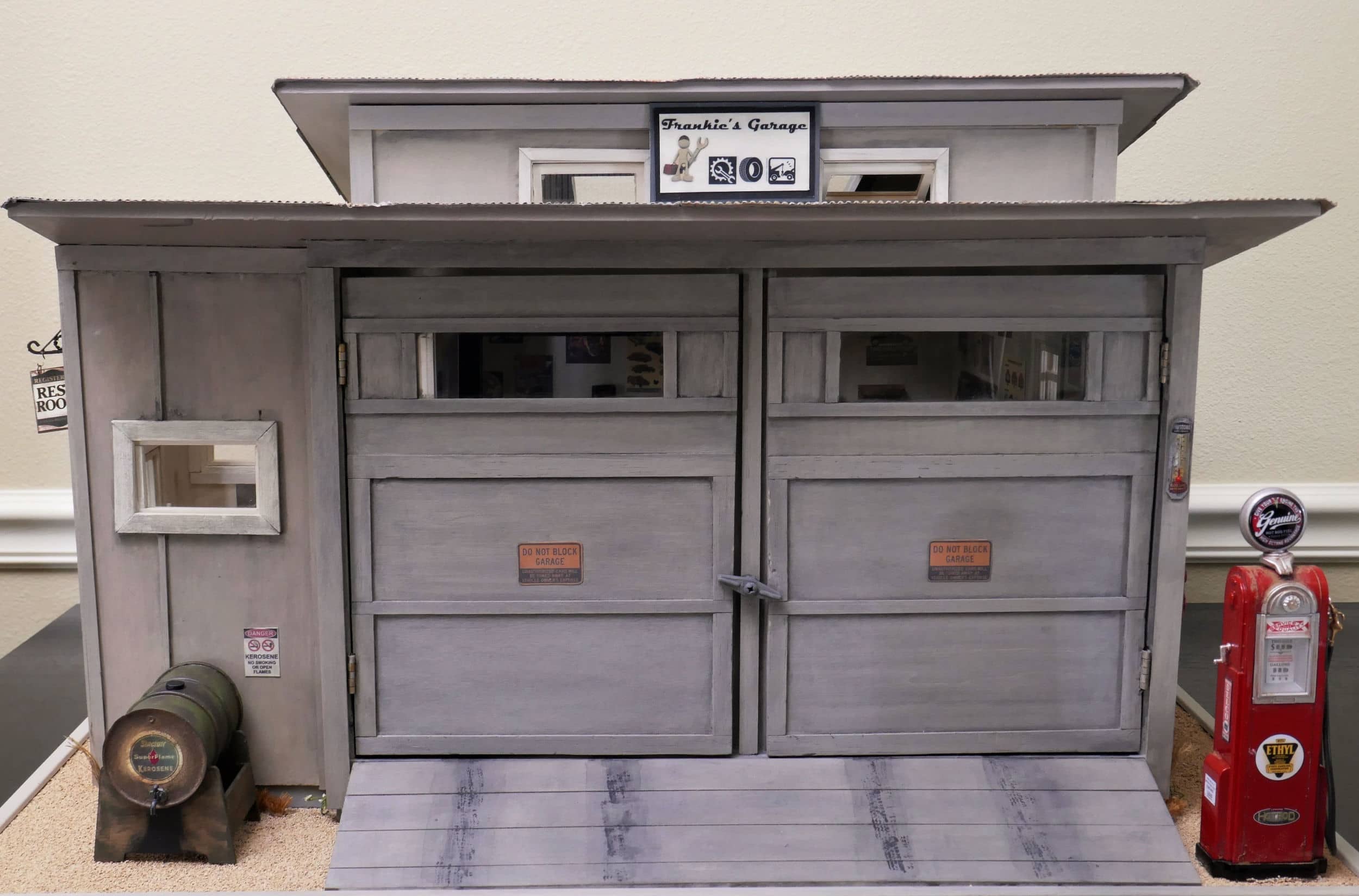 Front of garage with doors closed