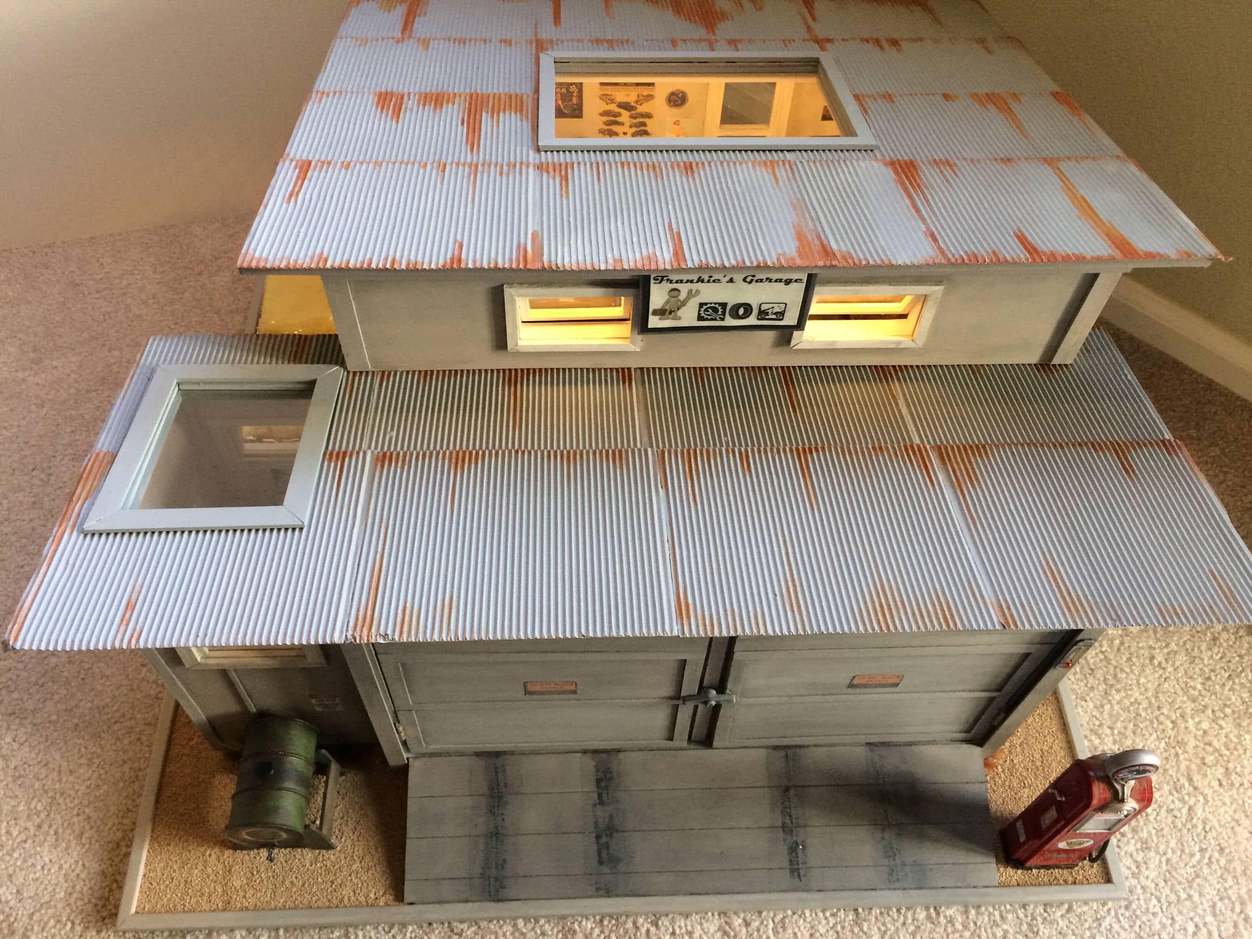 Back view of garage and tin roof