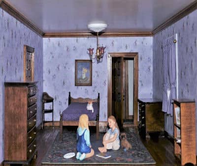 You girl's bedroom with fairy wallpaper